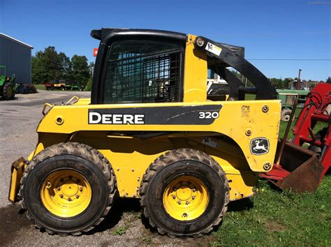 john deere 320 skid steer loader